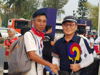 김도영 경북양궁협회장, 북한 양궁감독과 만나