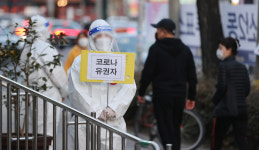 [포토] 소중한 한표…대구 침산동 코로나19 확진 유권자 투표