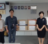 광진구약사회,소아마비협회 정립전자에 구급약 전달