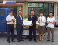김종헌 (주)성일종합건설 대표, 논산 취암동에 쌀 전달