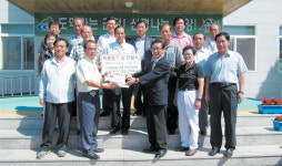 신기산업, 어려운 이웃에 쌀 100포 전달