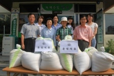 우양건설·홍성식품, 쌀 기탁