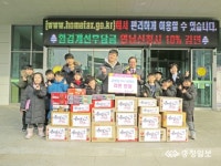 금메달석사태권도, 고사리 손으로 모은 라면 기탁