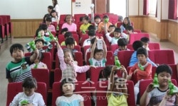 진도노인복지관·오산초, 저금통 나눔 행사