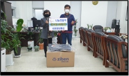 이화정보통신, 무실동 저소득 독거 어르신 겨울점퍼 후원