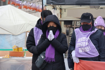 이태원 참사 희생자 영정 품고 눈속 행진...