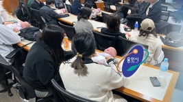 용인시, 휴머노이드 아기 돌봄 체험