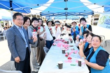 군위군 의흥전통시장에서 ‘자원봉사가 꽃피는 오일장’ 열어