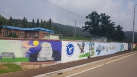 파주월롱면사무소, 군부대 담장벽화 및 마을정원 조성사업 완료