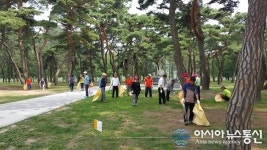 영동 양산면·주민자치위, 송호관광지서 환경정화 활동