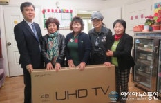 가양2동 주민들, 파랑지역아동센터에 TV 전달