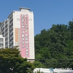 'KCC건설 분양때 약속한 준공도로 내놓아라'