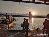 오징어 만선 기다리는 아낙네