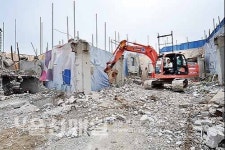 중구 21년 도심흉물 코아빌딩 건물 해체작업 돌입 55층 주상복합 건립…랜드마크 기대