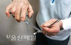장인정신 깃든 가위질… 손님 스타일 고민할 때 가장 행복