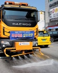 가평군 더위 날려버릴 도로 살수 작전