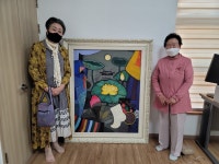 어르신 건강 기원…치매미술치료협, 연꽃그림 선물