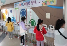 용인 새빛초, 마을과 함께 하는 가족사진 전시회 개최