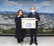 (주)우현건설 동두천시에 1000만원 및 백미 전달