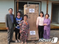 전남 장성군 북이면여성자원봉사회, 화재피해 주민에 전자제품 전달
