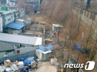 성북구-주민 협력...유휴지가 주차장으로