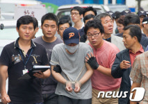 범행현장으로 걸어가는 피의자 김모씨