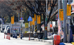 [어떻게 생각하십니까?] 과도한 주정차 단속 경고표지판