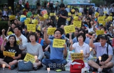 국정원 규탄 촛불 13일째, “6일 대규모 촛불 집회 할 것”