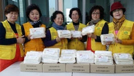 강서1동자원봉사대, 가래떡 팔아 성금 마련  