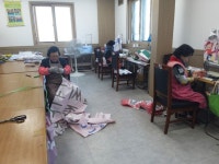 교현2동 향기누리봉사팀, 연탄재 자루 전달
