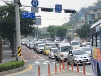 극심한 교통체증 100미터 도로 확장으로 해소