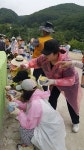 월명동 봉사단, 금산서 120m 대규모 벽화그리기 펼쳐