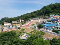 보문1구역 주거환경개선사업 일환 도로개설공사 준공