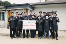 우진기전, 연탄배달 봉사