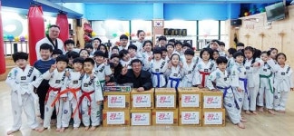 광주시 동구 산수2동, 태권도장 아동들 ‘사랑의 라면’ 전달