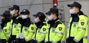 난동으로 체포했더니... “신종코로나 걸린 것 같다” 꾀병 부린 남성
