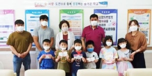 화순군 도곡면 청년회,초·중 신입생 29명에게 문화상품권 전달