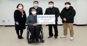 진안군청 공무원노동조합, 진안군장애인체육회에 후원금 전달