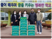 담양군 금성면 지역사회보장협의체, 관내 초등학교에 사랑의 마스크 전달