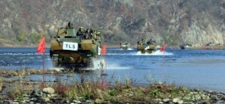 도하 굳은 의지, 강변 한파 칼바람도 녹였다