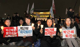‘주님의 정의’ 염원하는 신앙인의 촛불