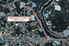 10월중 효돈 입구 교차로~효돈중 도로 마무리