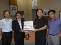 전주 우성사우나 덕진구에 성금 기탁
