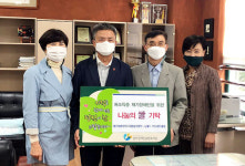 제주도자원봉사센터-뉴월드 이도센트롤점, 나눔의 쌀 전달