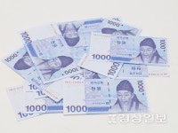 편의점서도 쓸일 없어진 1000원