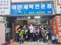 수원시 영통2동, 비 피해 입은 상가에 주민들이 나서서 복구 작업 진행