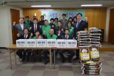 재전송-하이트진로(주)청주지점, 쌀 전달