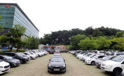 솔밭공원, 청주산단 기업 주차장 전락