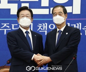 악수하는 이재명·한덕수