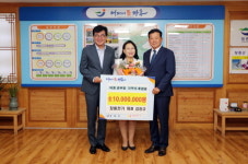 [포토] 장흥전기 김장규 대표, 나눔리더 릴레이 7호 가입